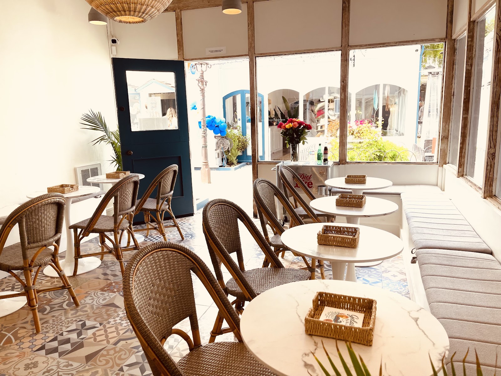 Owner-attributed photo of the bright seating area and decor